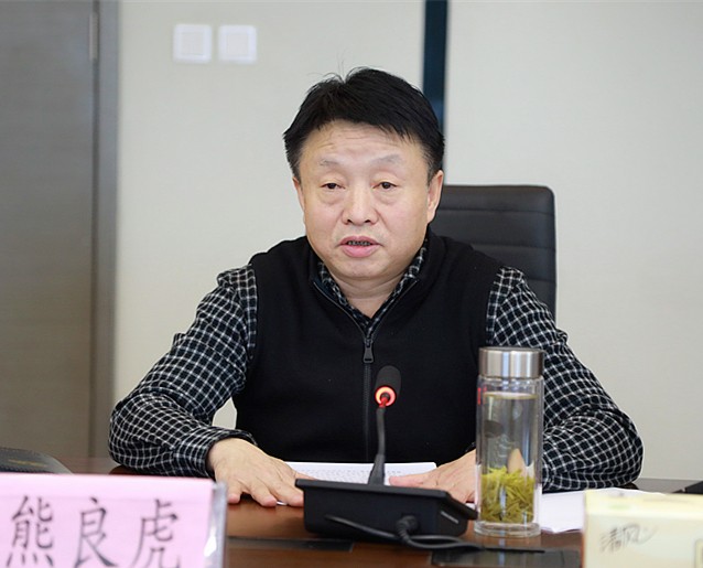 熊良虎会见西安市城管局局长李平伟